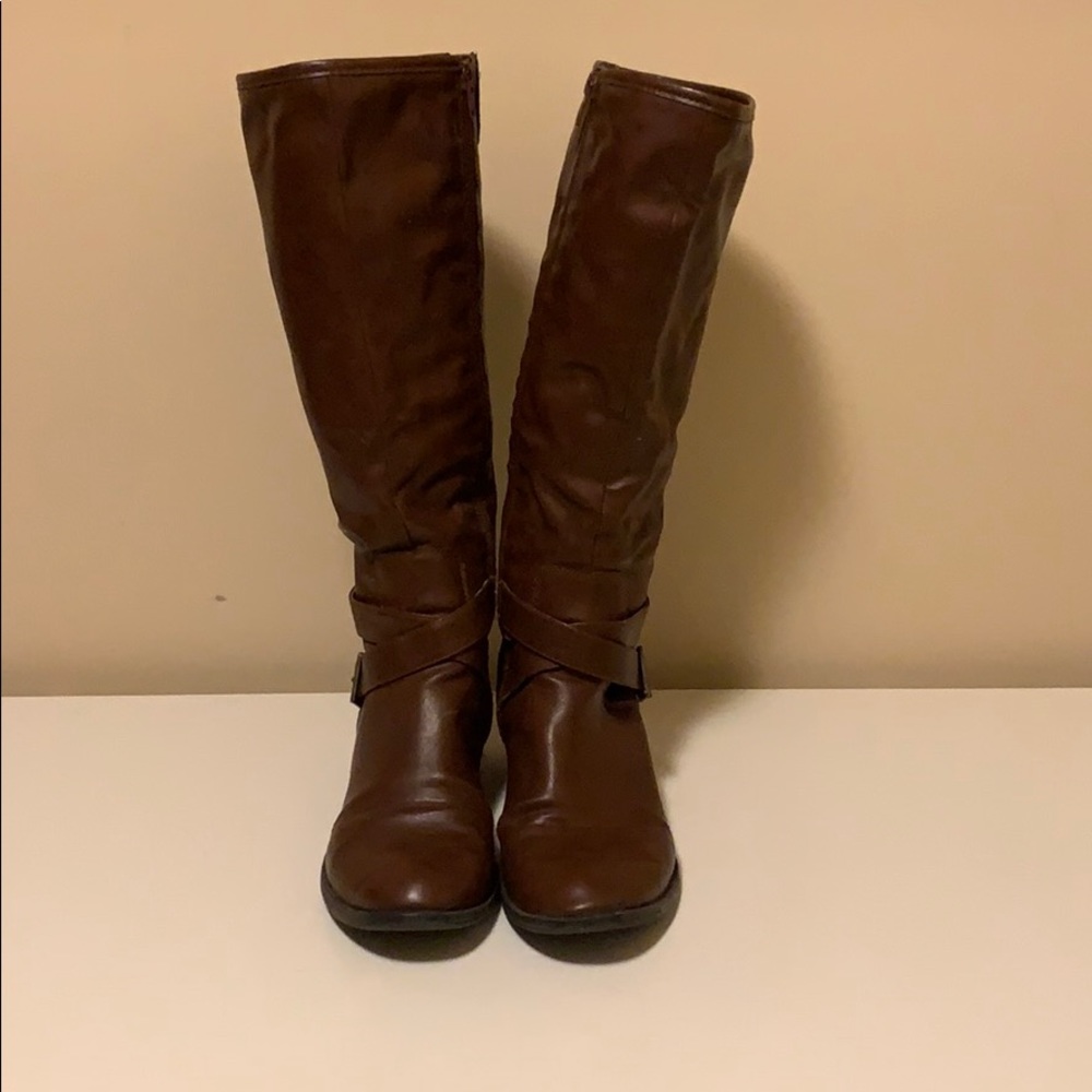 Tall brown boots.